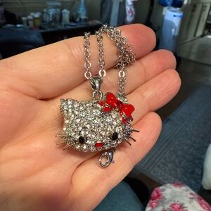 Sparkling Cat Pendant Necklace with Red Bow